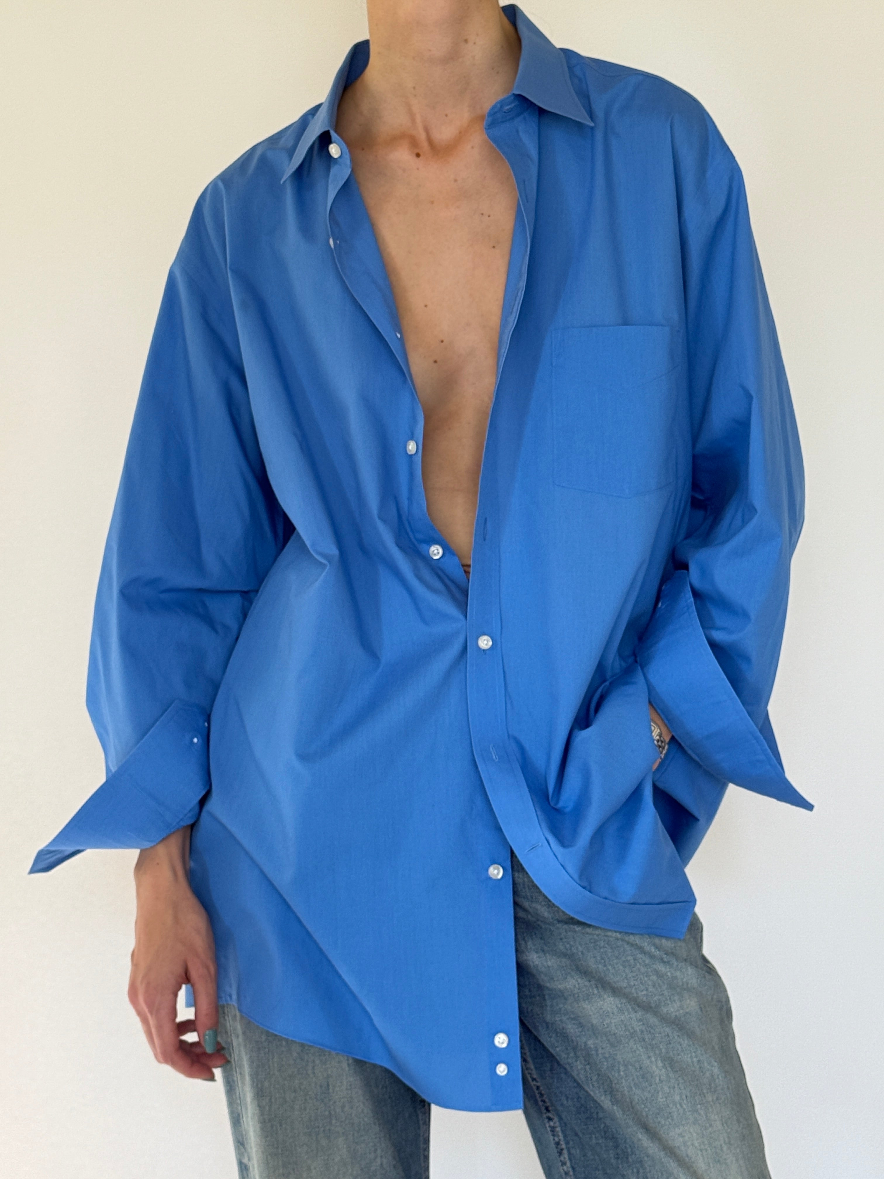 Vintage oversized blue button up shirt close-up front detail