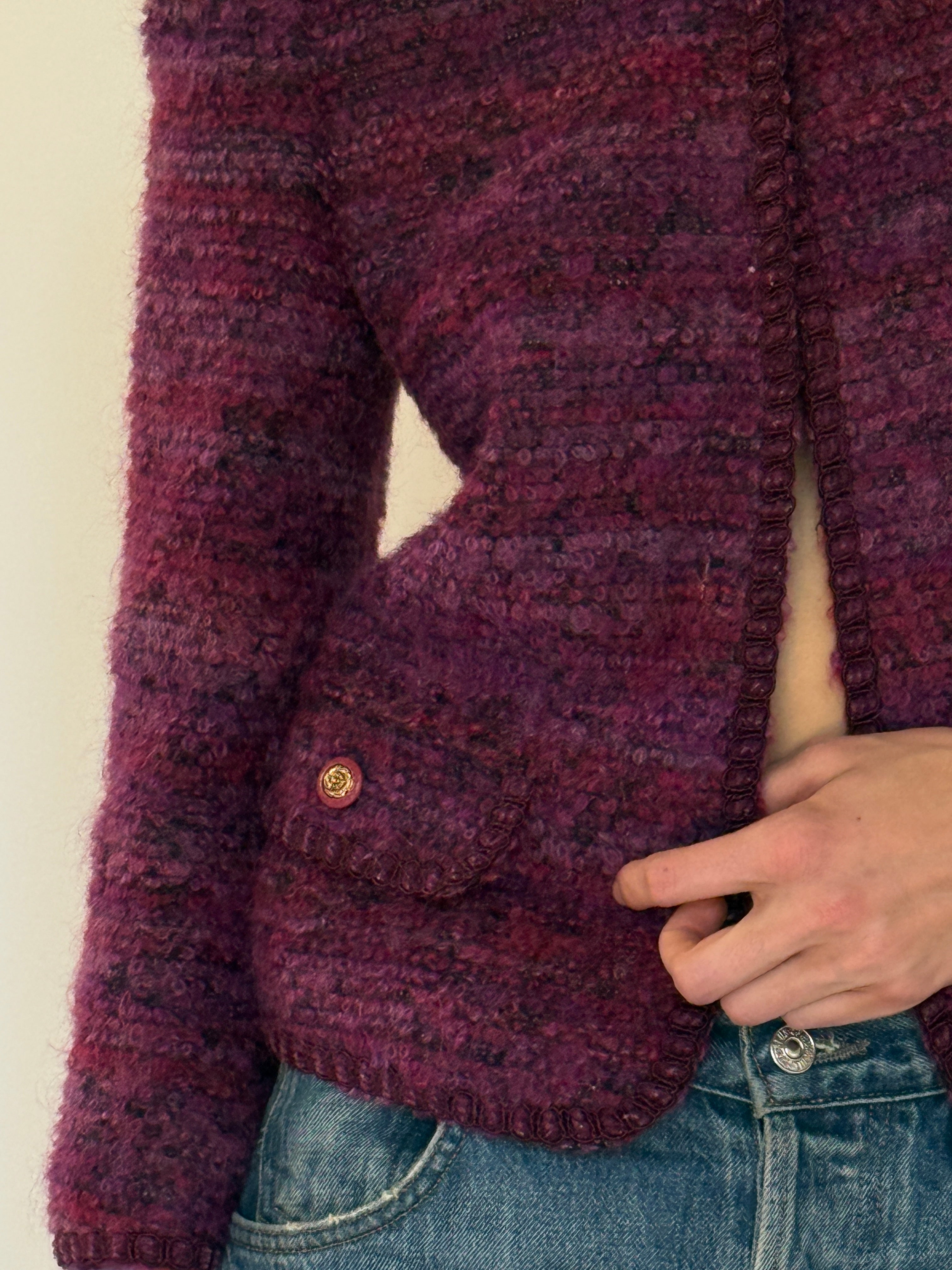 Vintage purple bouclé fabric close-up texture