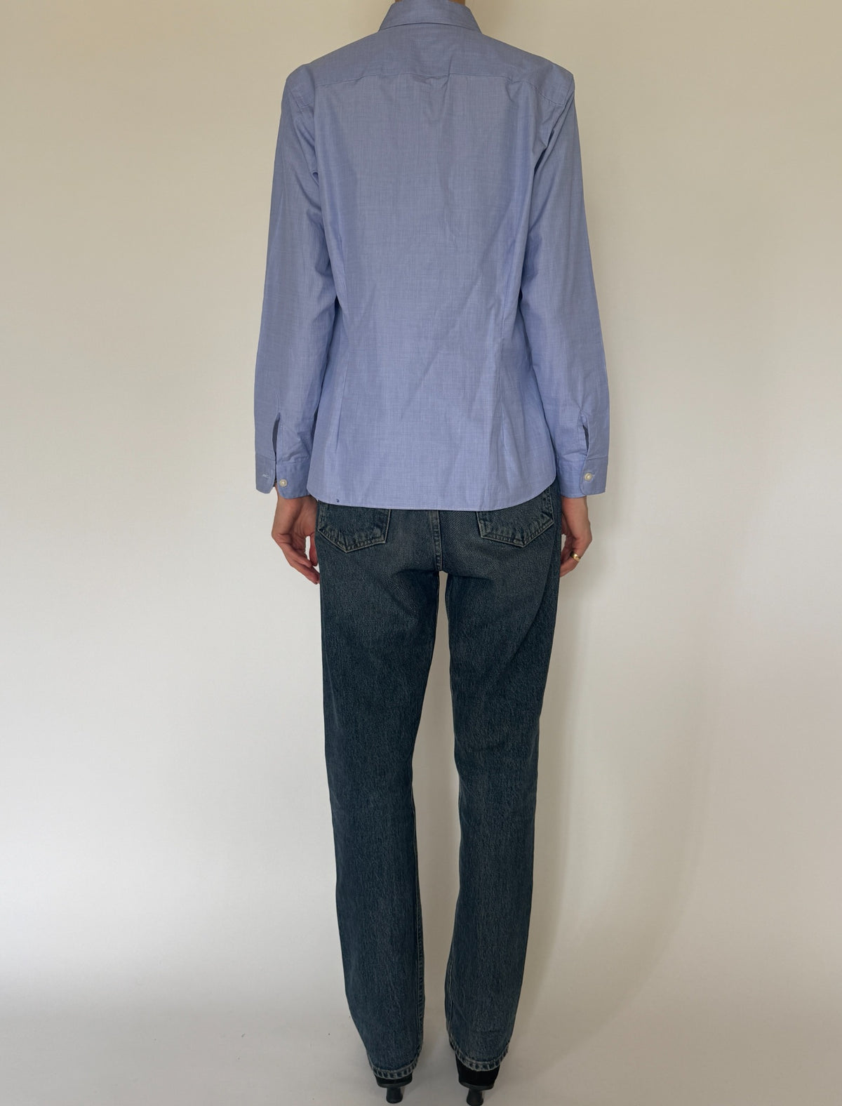 Back view of vintage light blue button-up shirt