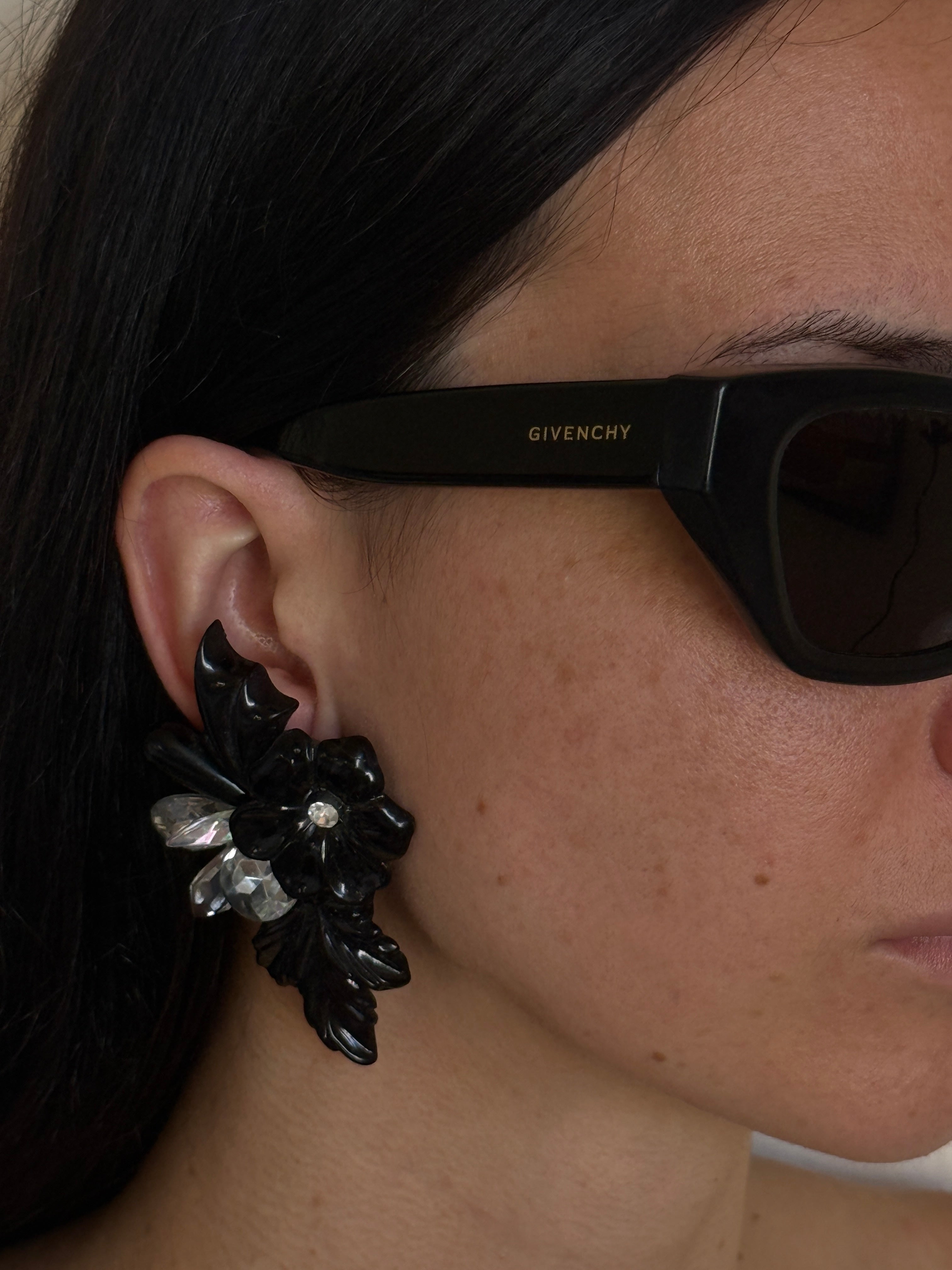 Vintage black floral statement earrings front view