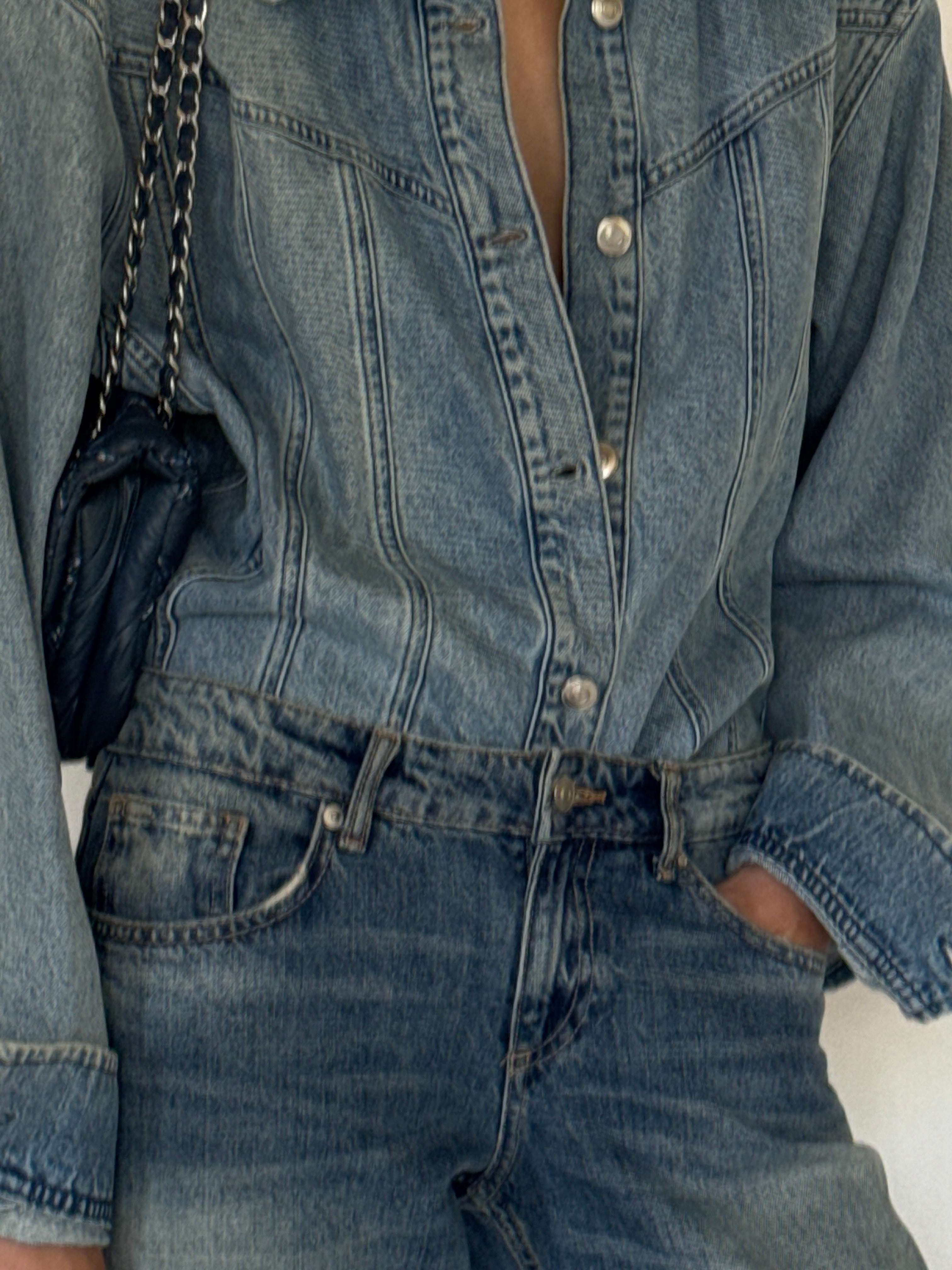 Vintage denim shirt seam detail close-up