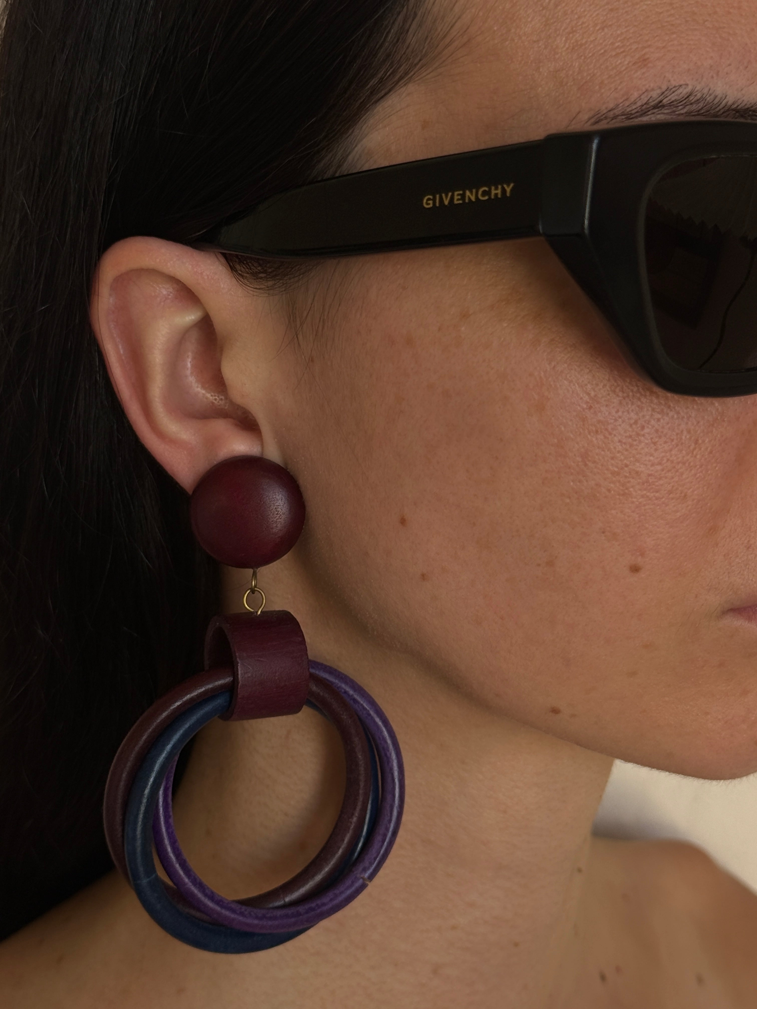 Vintage oversized wooden hoop earrings front view
