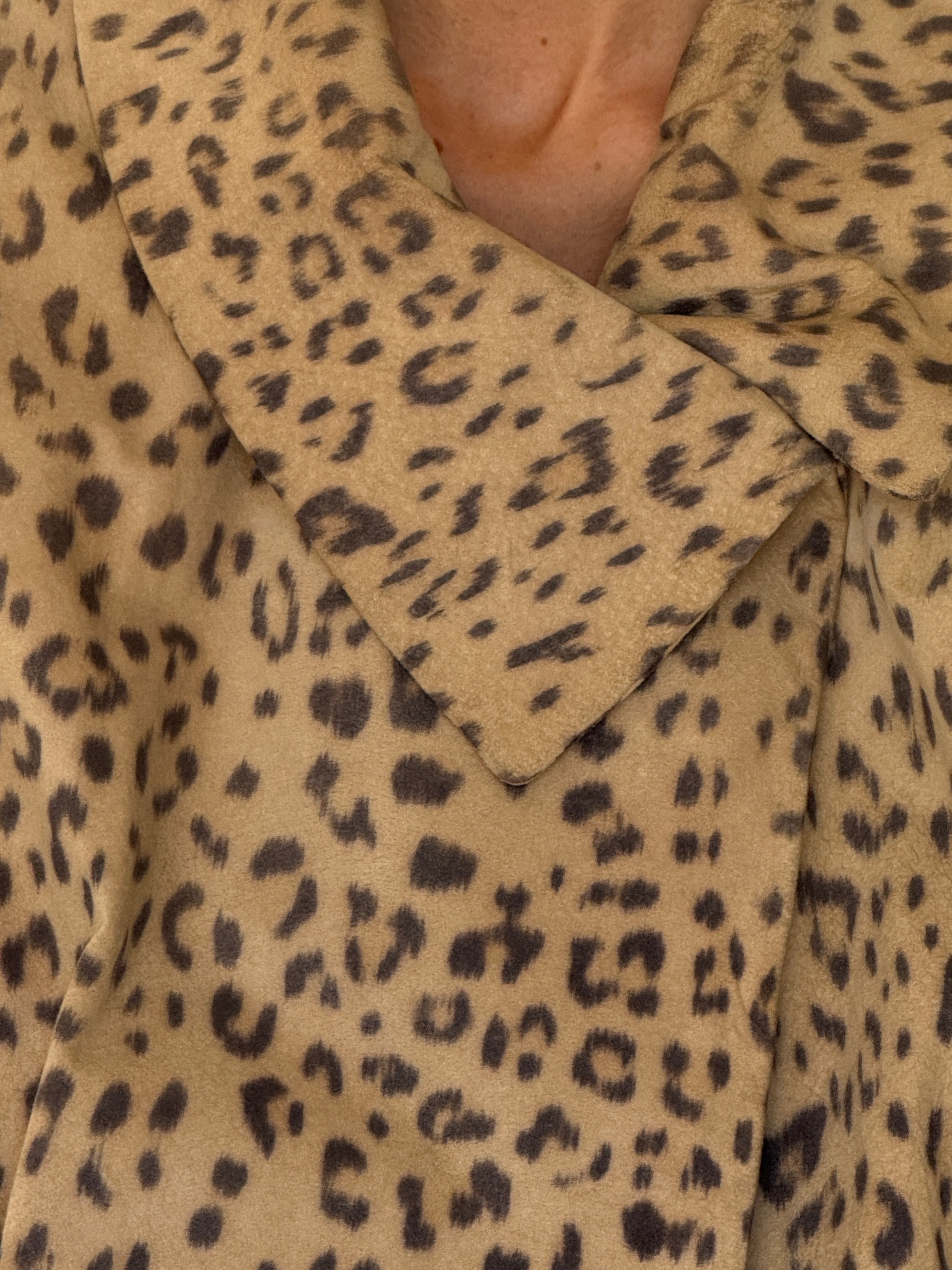Vintage tan leopard suede jacket fabric close-up
