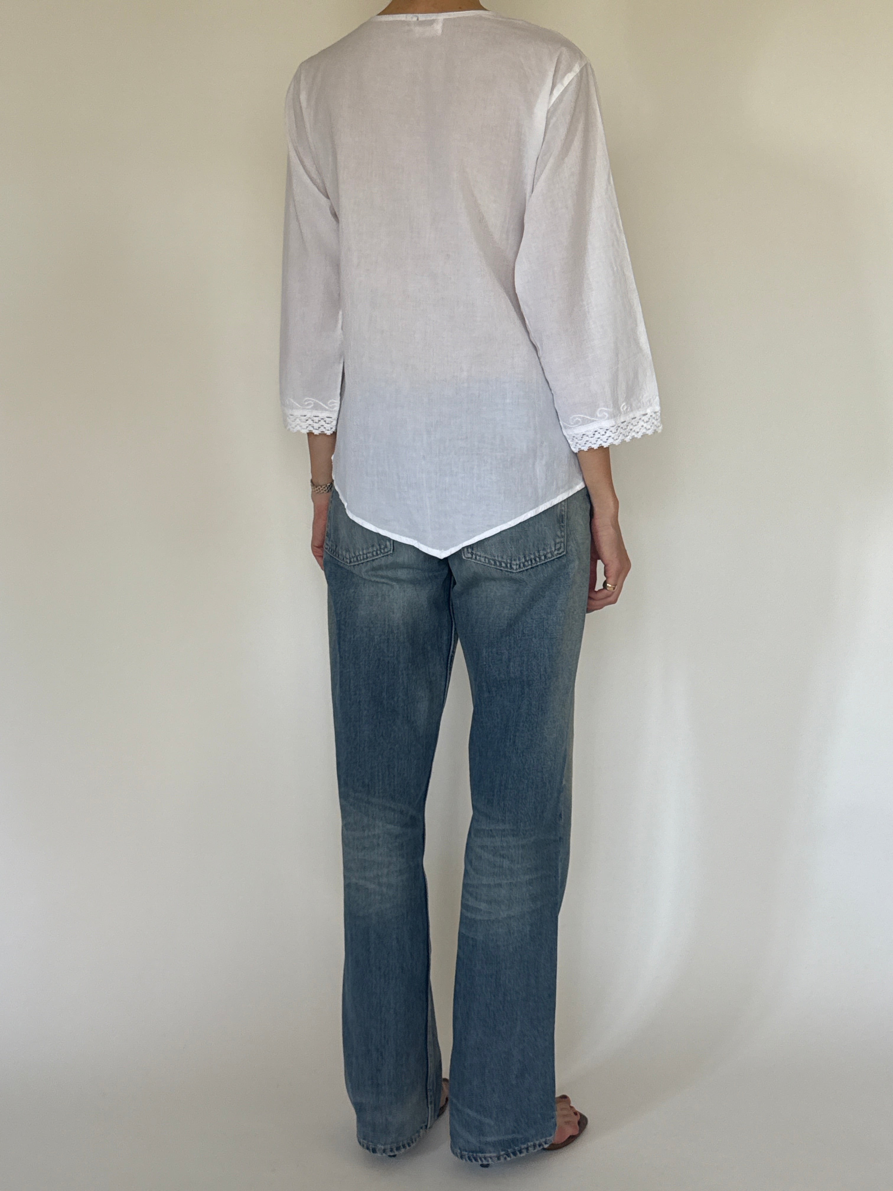 Vintage white embroidered cotton blouse back view