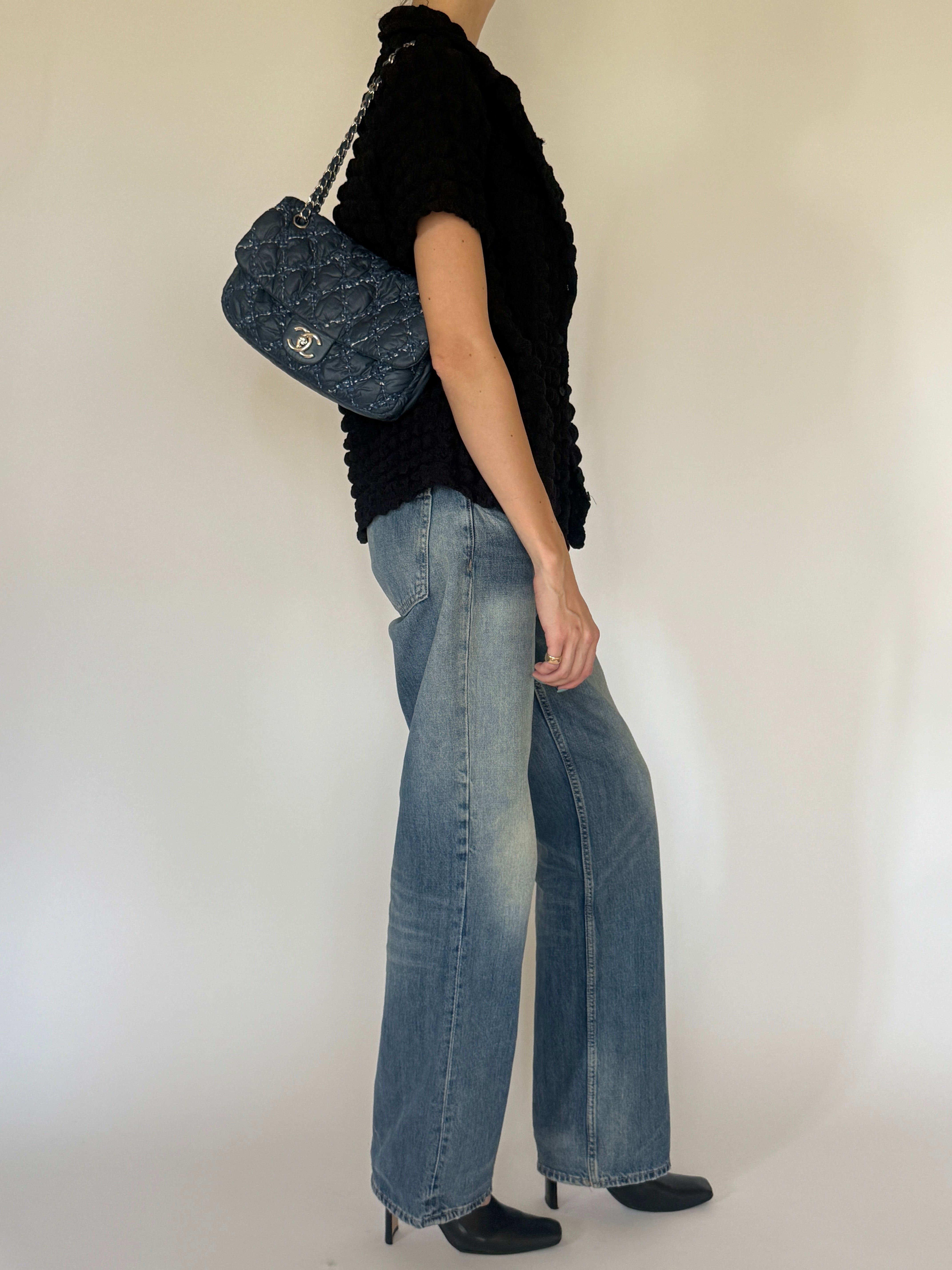 Vintage black textured short sleeve top side angle
