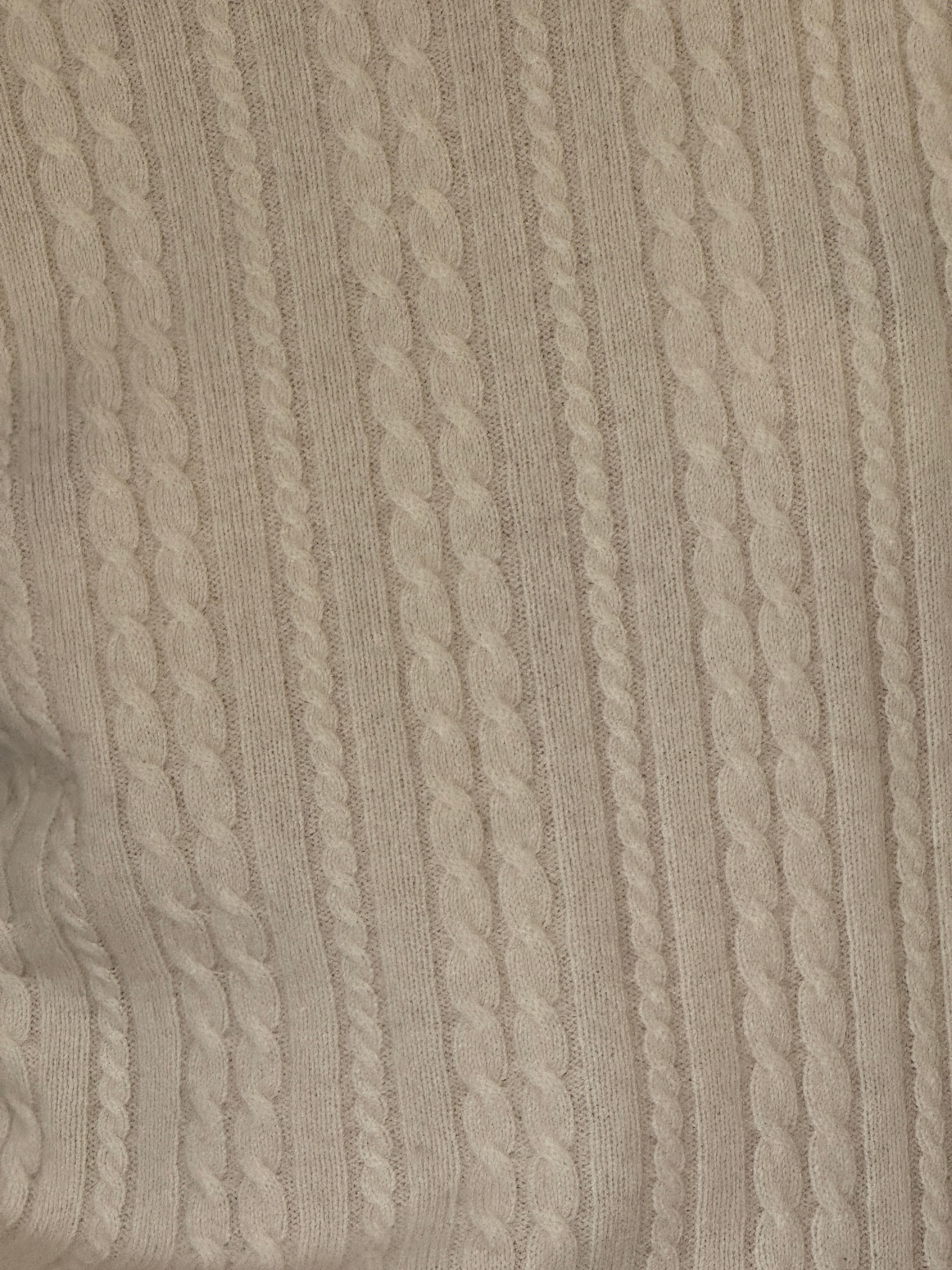 Vintage cream cashmere cable knit fabric close-up