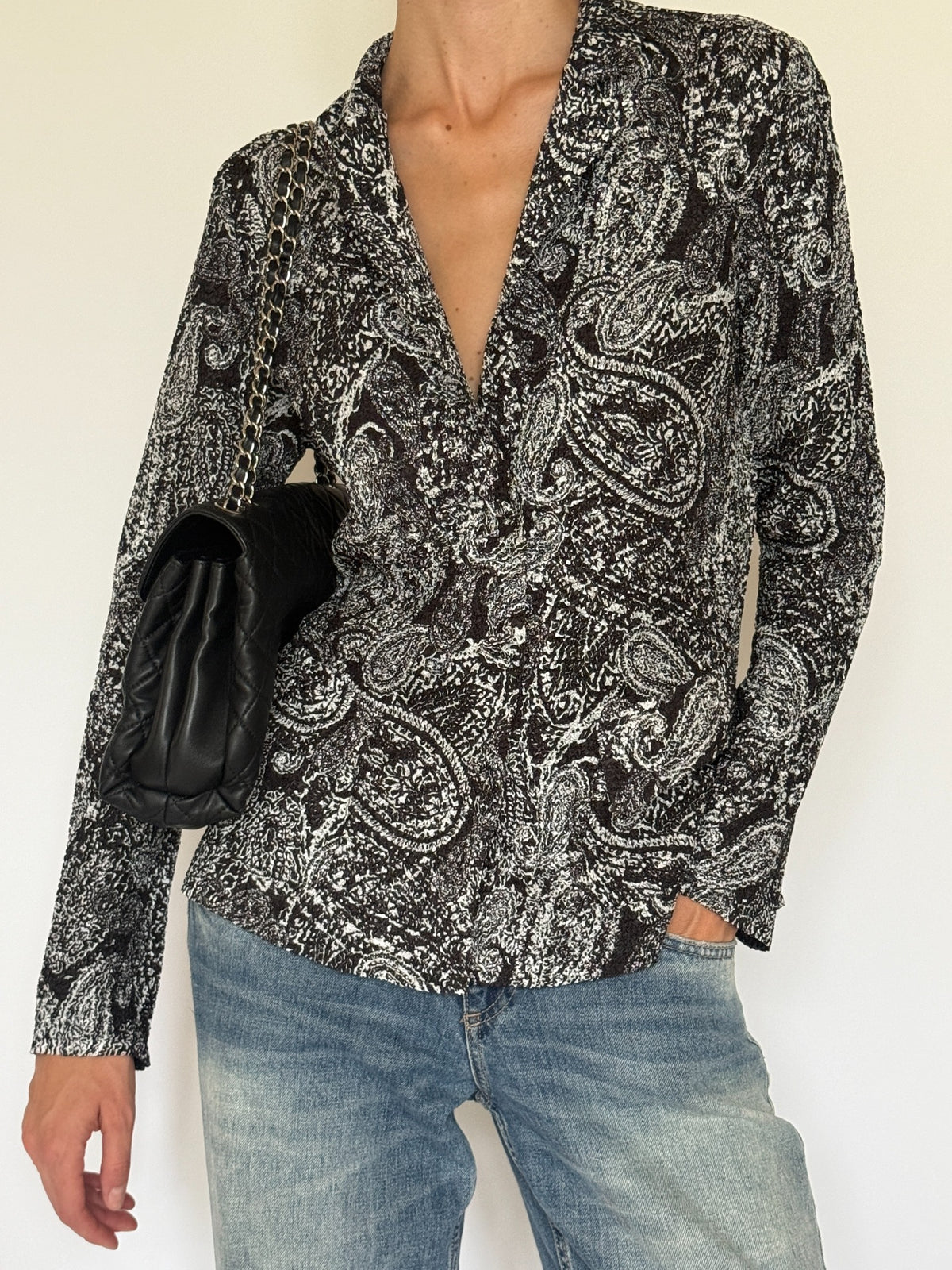 Vintage textured black and white paisley button-front blouse