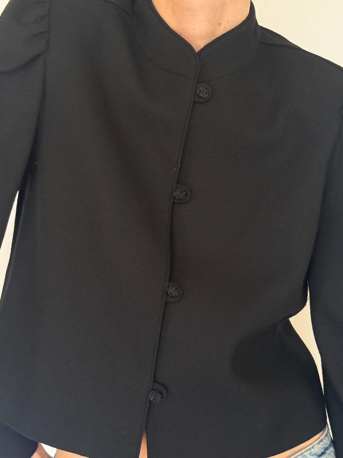 Vintage black wool jacket back view with clean cropped silhouette