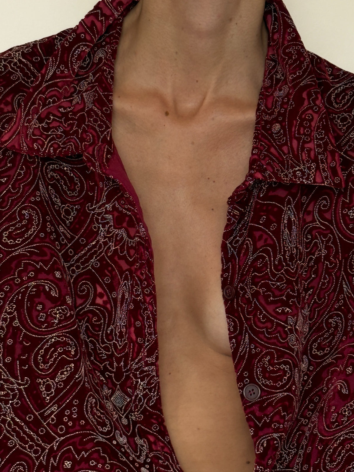 Vintage burgundy paisley shirt collar and button detail