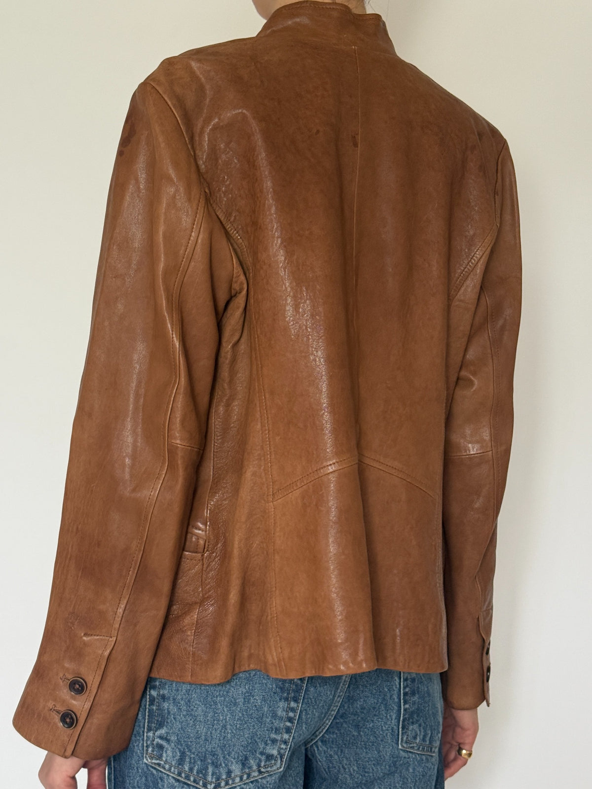 Vintage cognac leather jacket back view