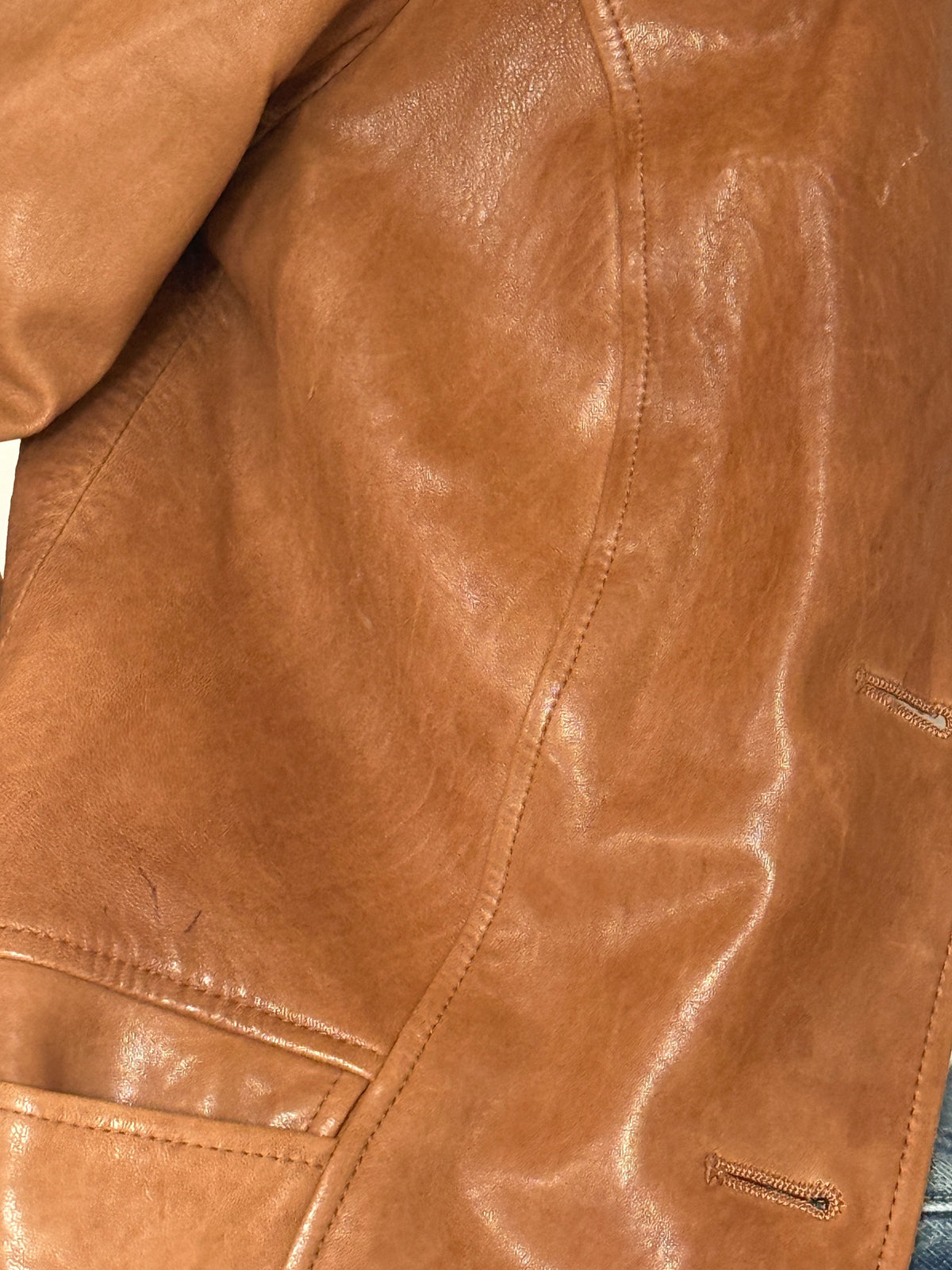 Vintage cognac leather jacket leather texture close-up