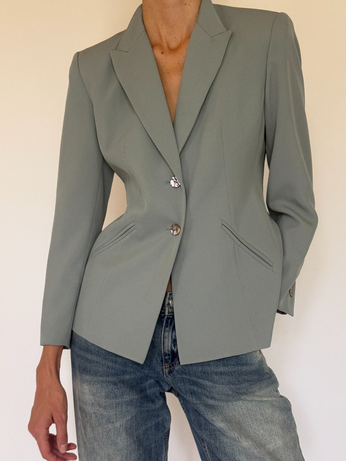Vintage faded mint blazer lapel and tailored waist detail