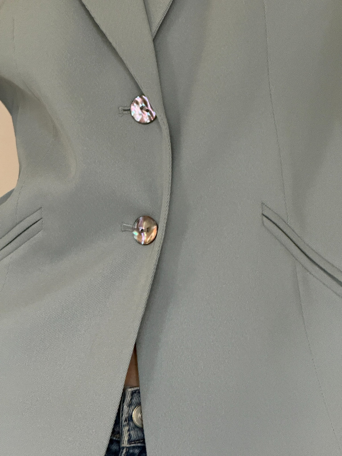 Vintage faded mint blazer shell button detail