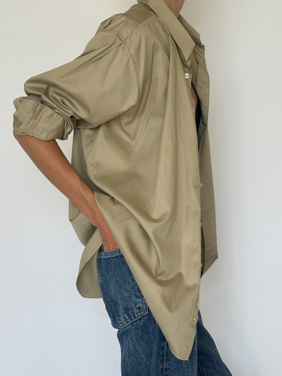 Vintage khaki oversized shirt side detail with rolled sleeve