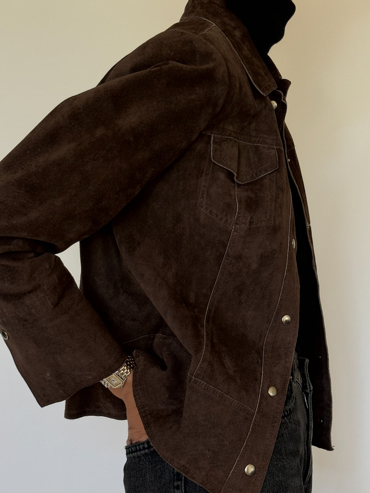 Vintage brown suede jacket angled view
