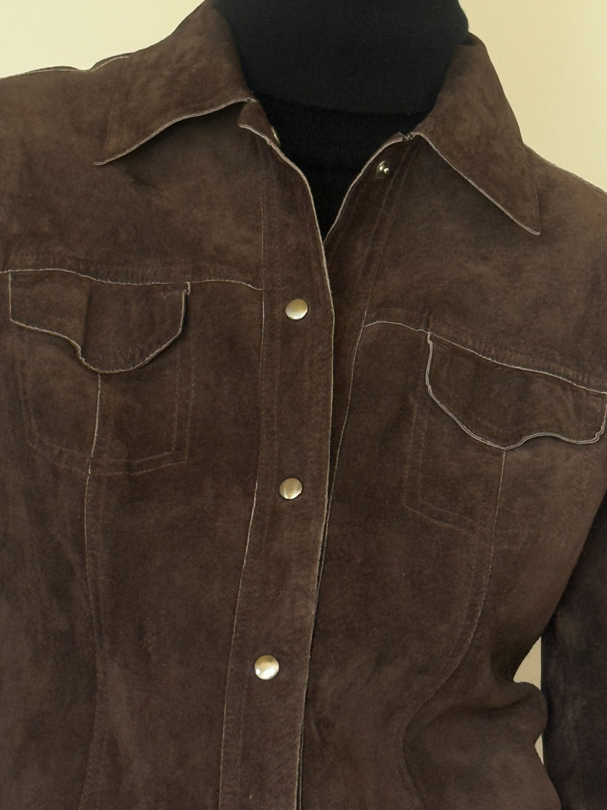 Vintage brown suede leather texture close-up