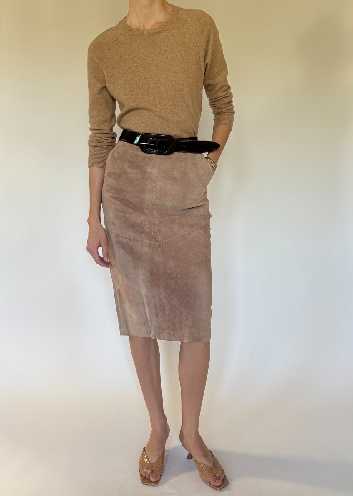 Vintage suede midi skirt front view in soft taupe brown with paneled seam detailing