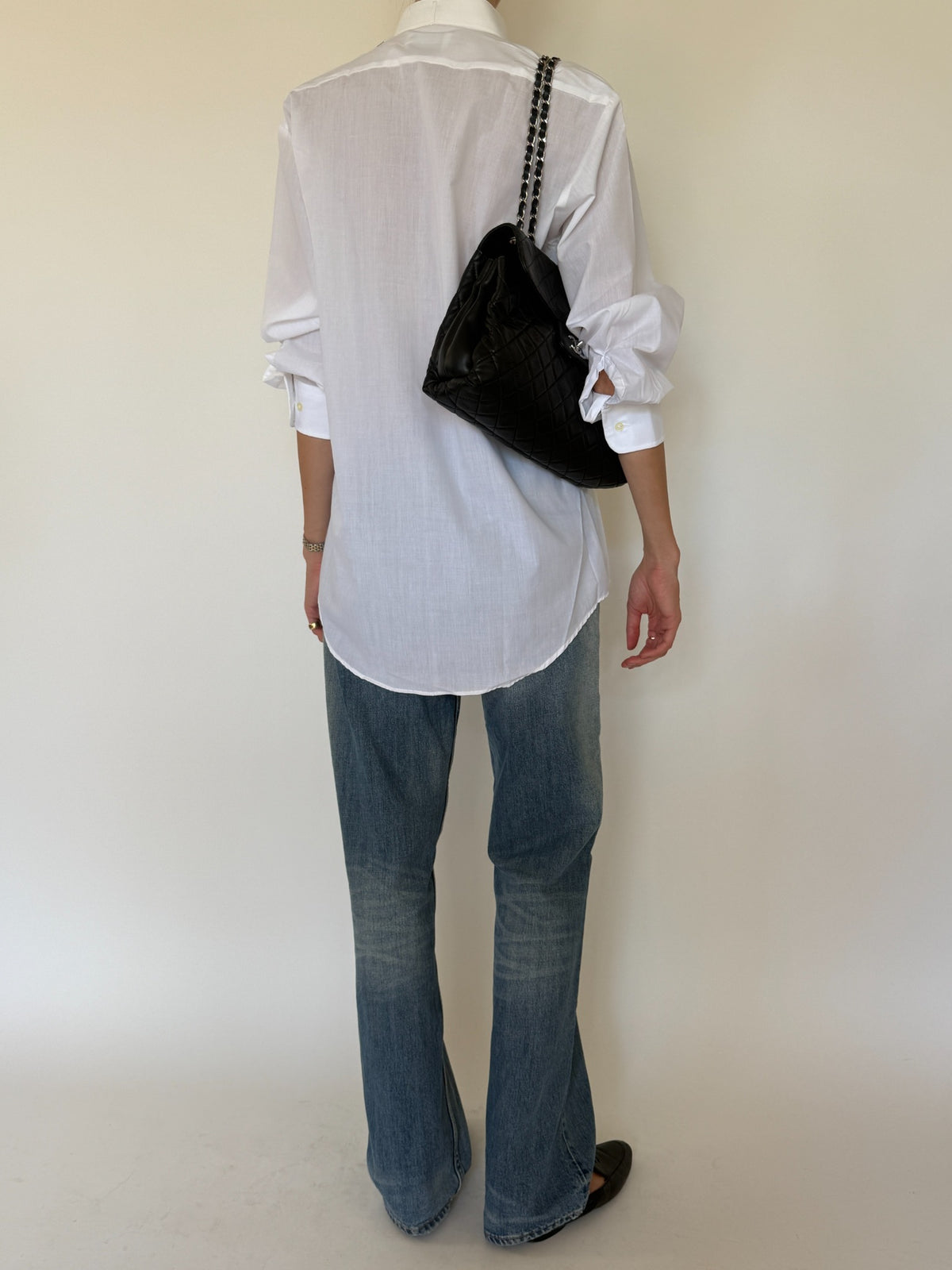Vintage white tuxedo shirt back view with shirttail hem