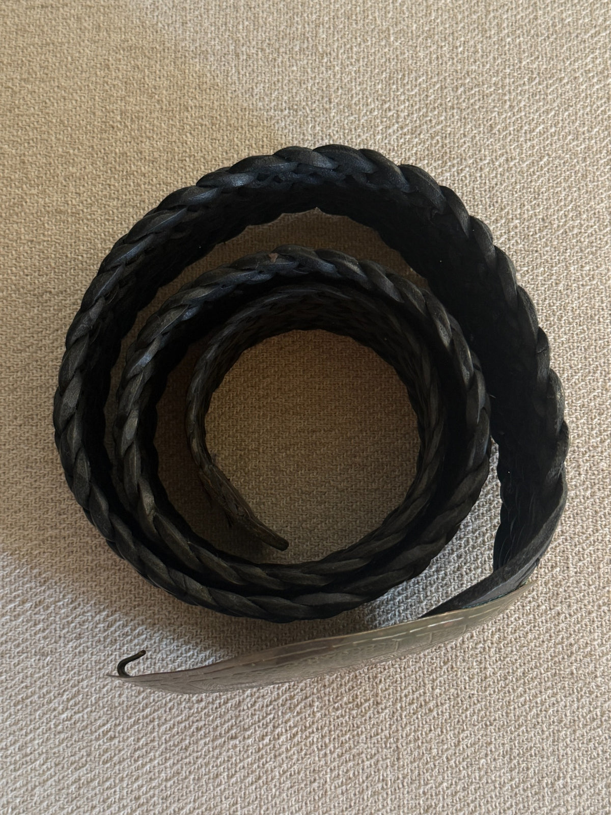 Vintage braided leather statement belt black rolled side view