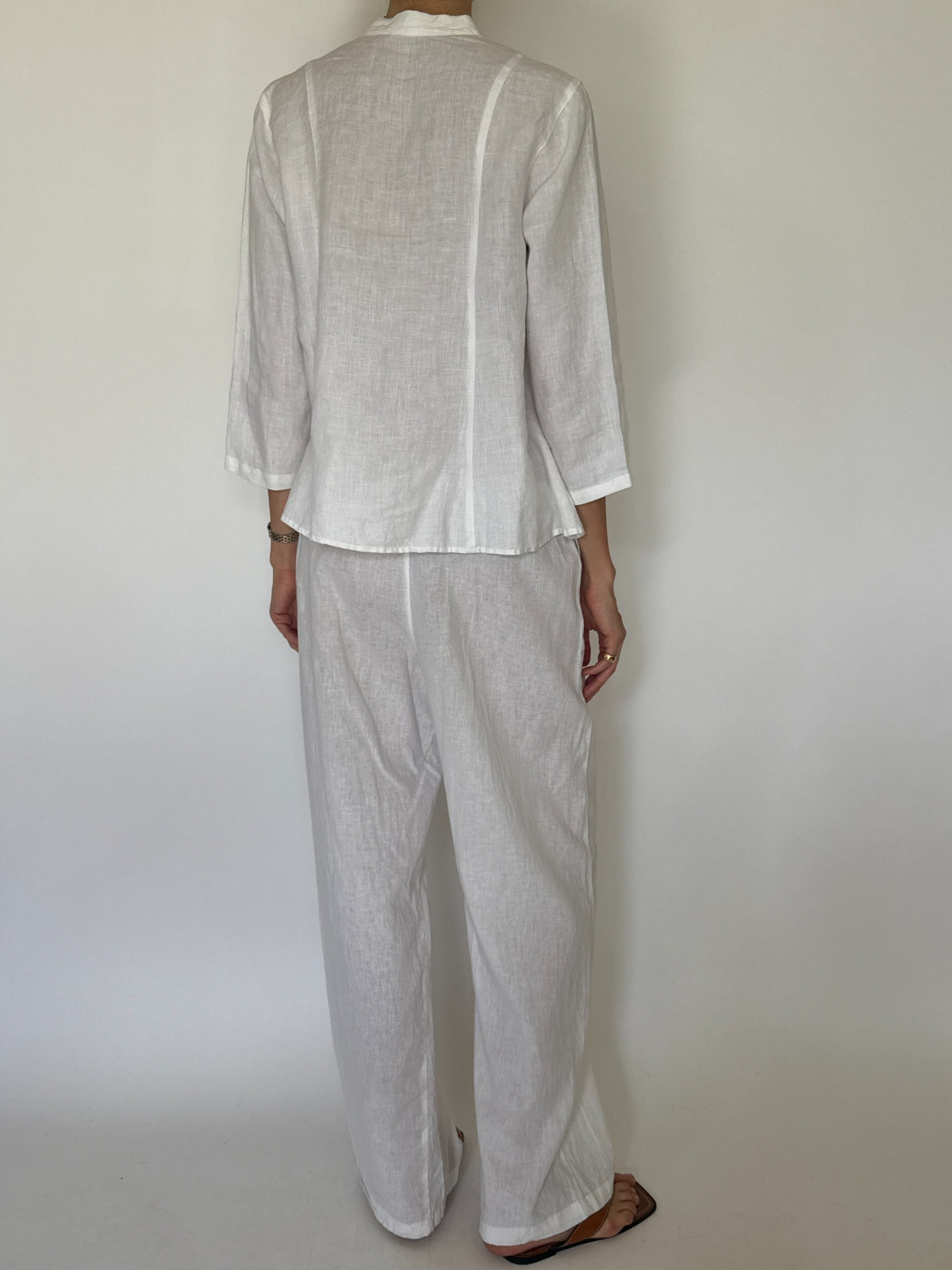 Vintage white linen button-front shirt with decorative marbled buttons