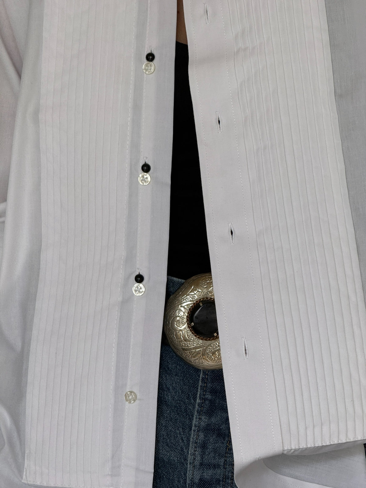 Vintage white tuxedo shirt button and pleated bib detail