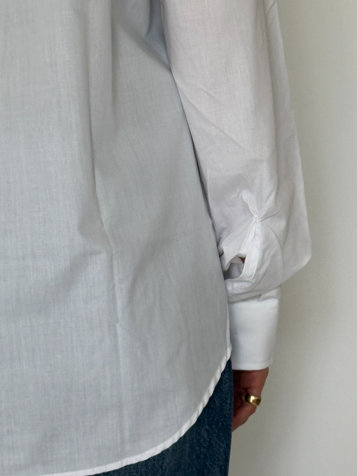 Vintage white tuxedo shirt cuff and back hem detail