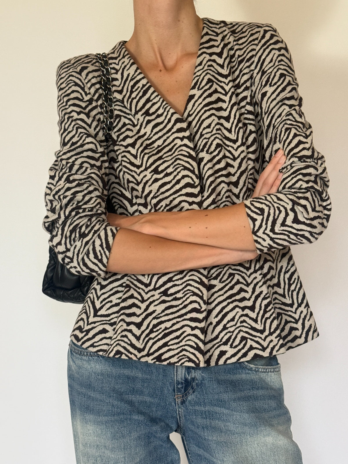 Vintage dark brown and cream zebra print jacket button detail